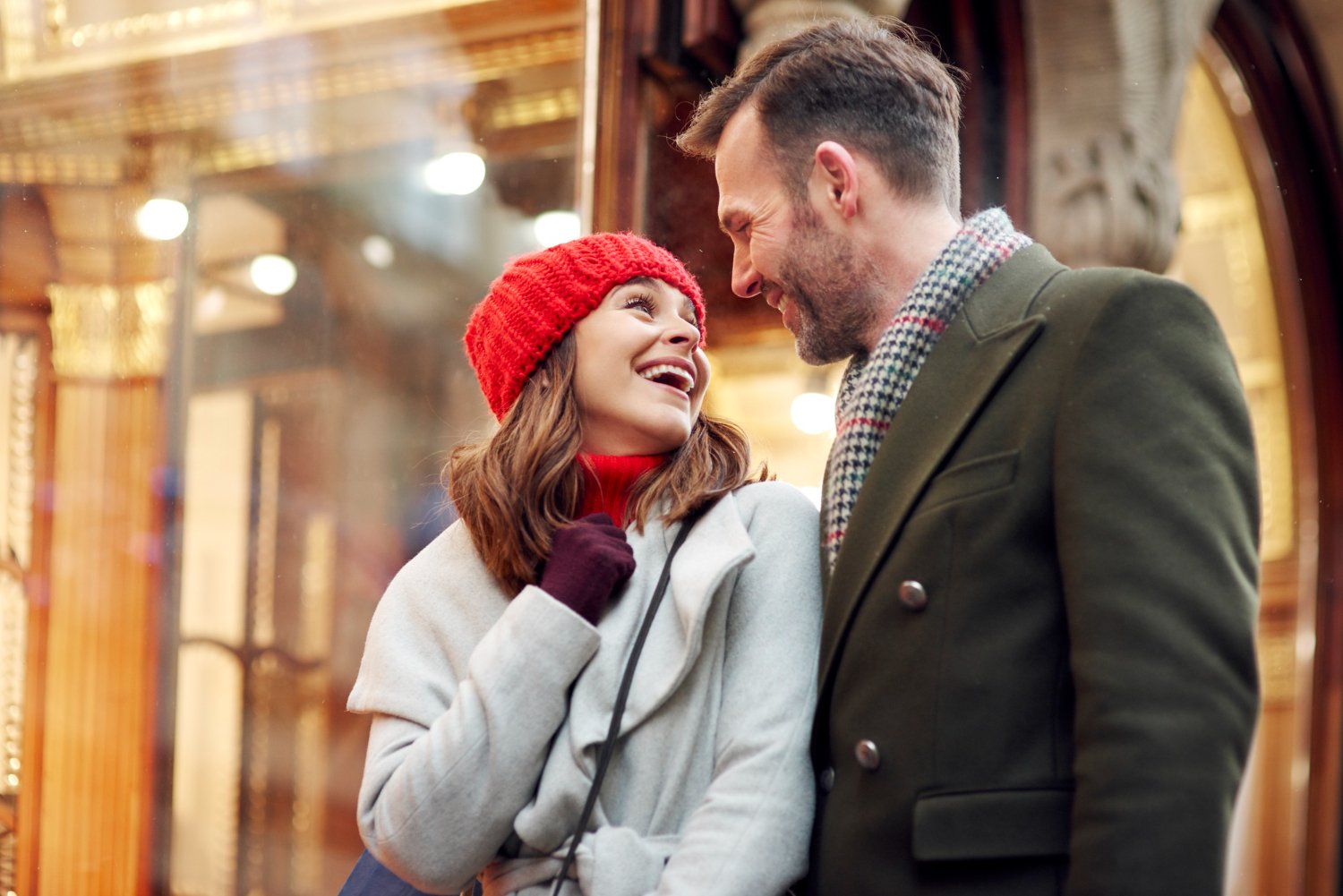A couple enjoying a warm moment together in a Manhattan neighborhood